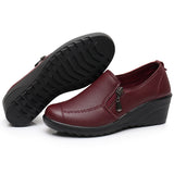 Chaussures à talons compensés en cuir pour femmes